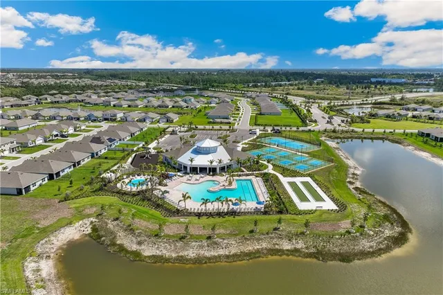 a view of a swimming pool with a lot of trees