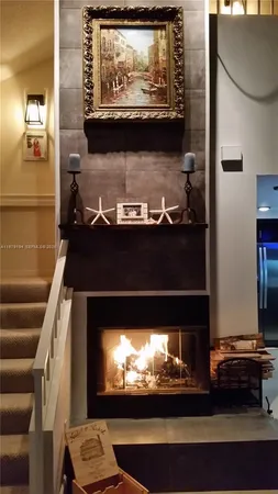 a view of fireplace with wooden floor