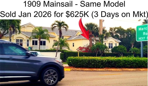 a view of multiple house with a street