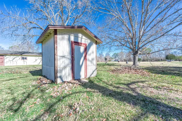 a view of a yard with an outdoor space