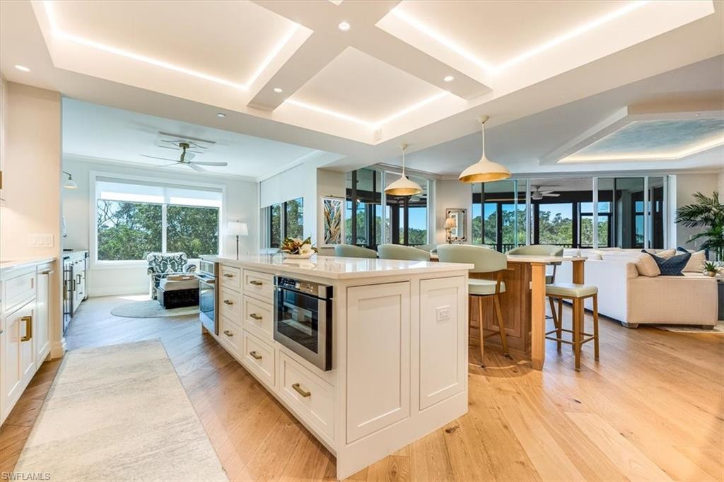 445 Cove Tower Drive, Unit 302 Naples, FL 34110 - Photo 1 of 50