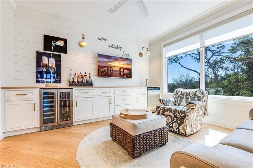 445 Cove Tower Drive, Unit 302 Naples, FL 34110 - Photo 13 of 50 Family Room / Dining Room