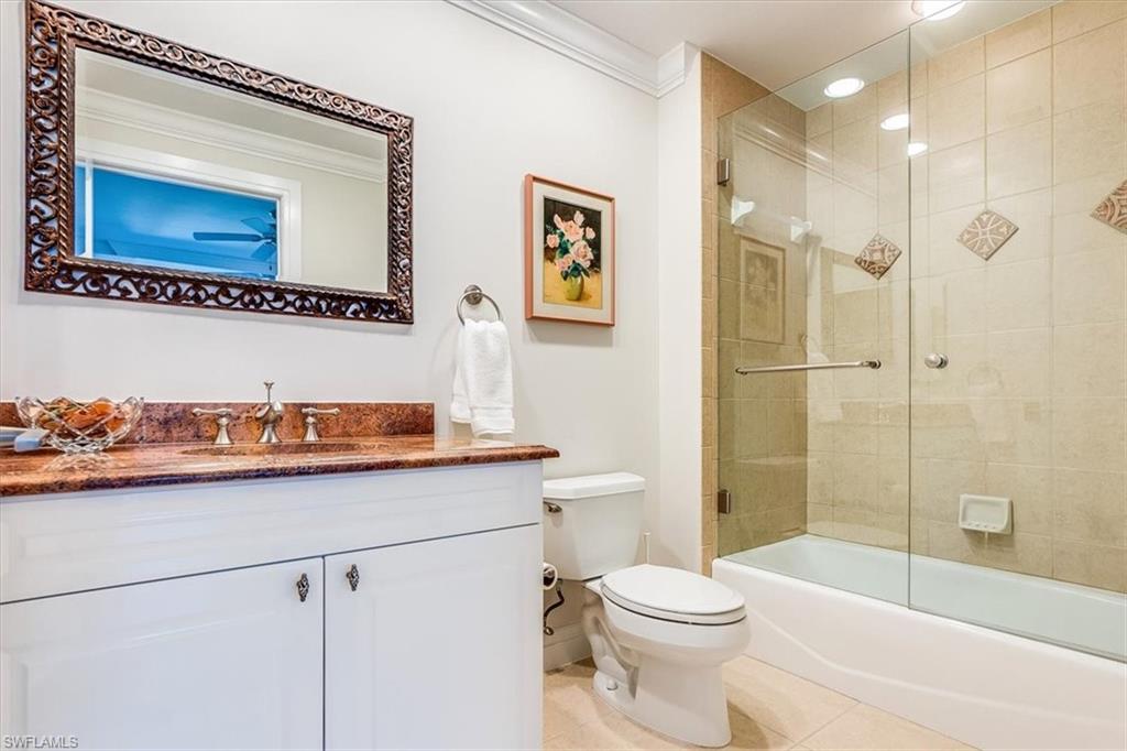 445 Cove Tower Drive, Unit 302 Naples, FL 34110 - Photo 28 of 50 En Suite Bathroom