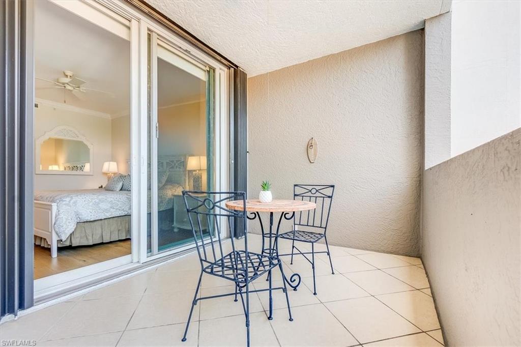 445 Cove Tower Drive, Unit 302 Naples, FL 34110 - Photo 29 of 50 2nd Balcony shared by the two guest bedrooms
