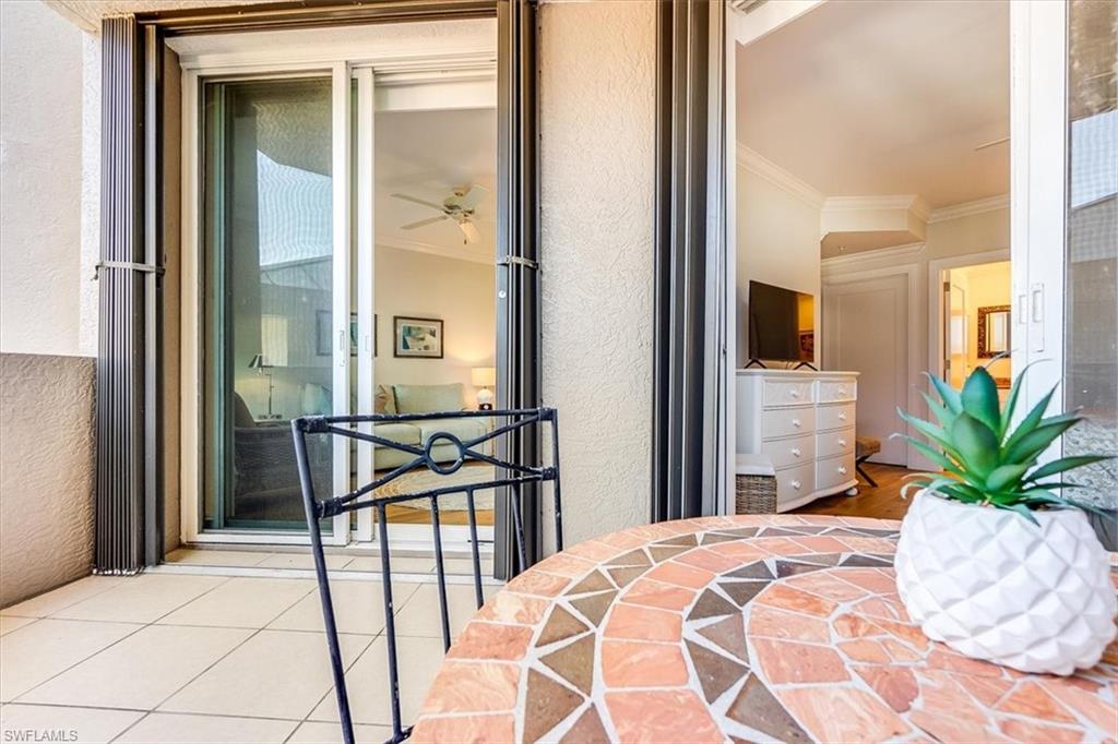 445 Cove Tower Drive, Unit 302 Naples, FL 34110 - Photo 30 of 50 2nd Balcony shared by the two guest bedrooms