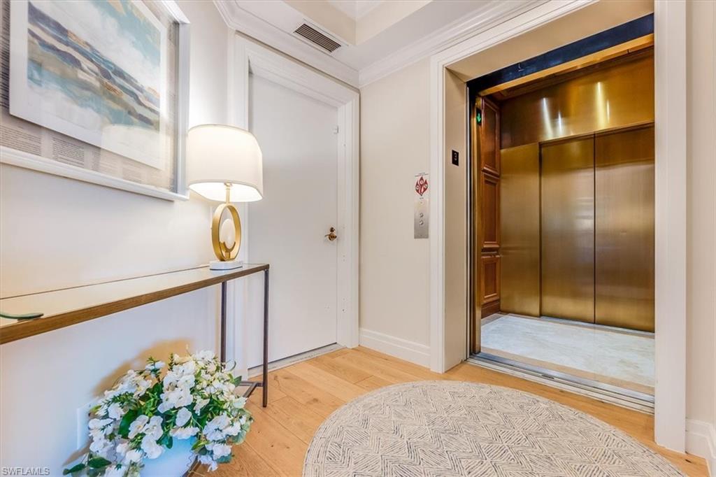 445 Cove Tower Drive, Unit 302 Naples, FL 34110 - Photo 3 of 50 Private Elevator
