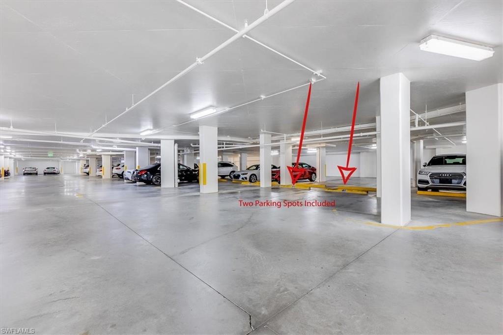 445 Cove Tower Drive, Unit 302 Naples, FL 34110 - Photo 36 of 50 2 parking spaces in the garage!