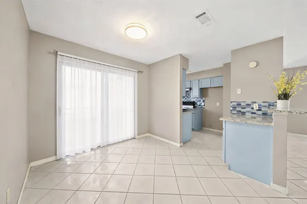a view of a kitchen with a sink