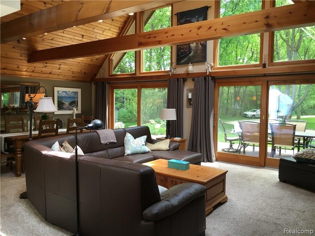 4306 Cordley Lake Road Pinckney, MI 48169 - Photo 9 of 52 Gorgeous Views from Wall of Windows