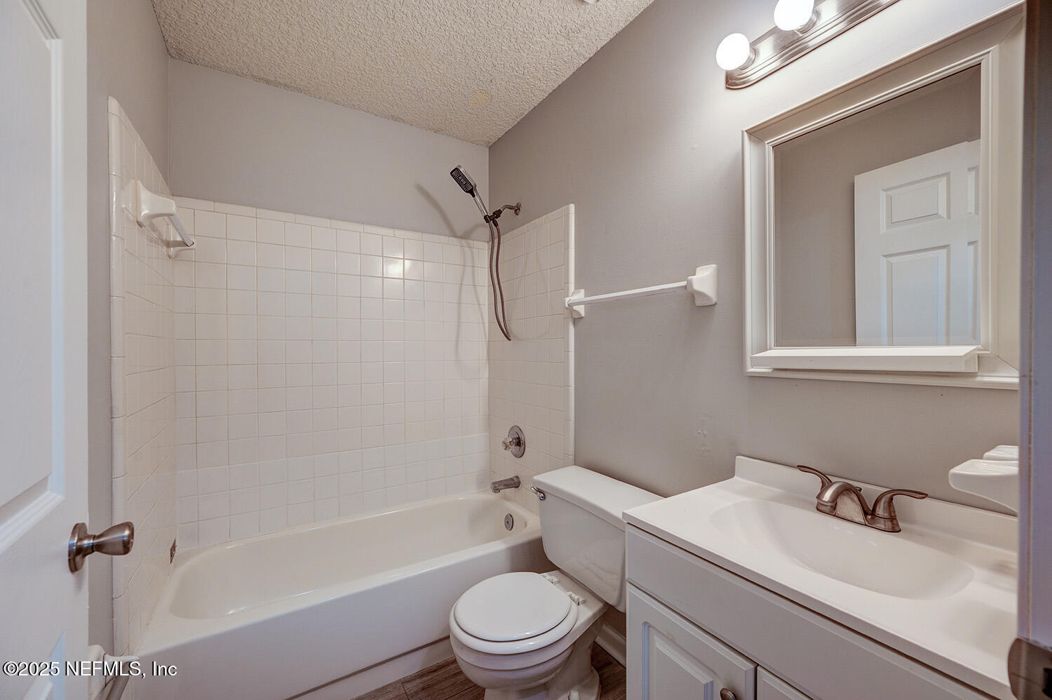 3248 Dowitcher Lane Orange Park, FL 32065 - Photo 18 of 23 a bathroom with a sink toilet vanity and shower