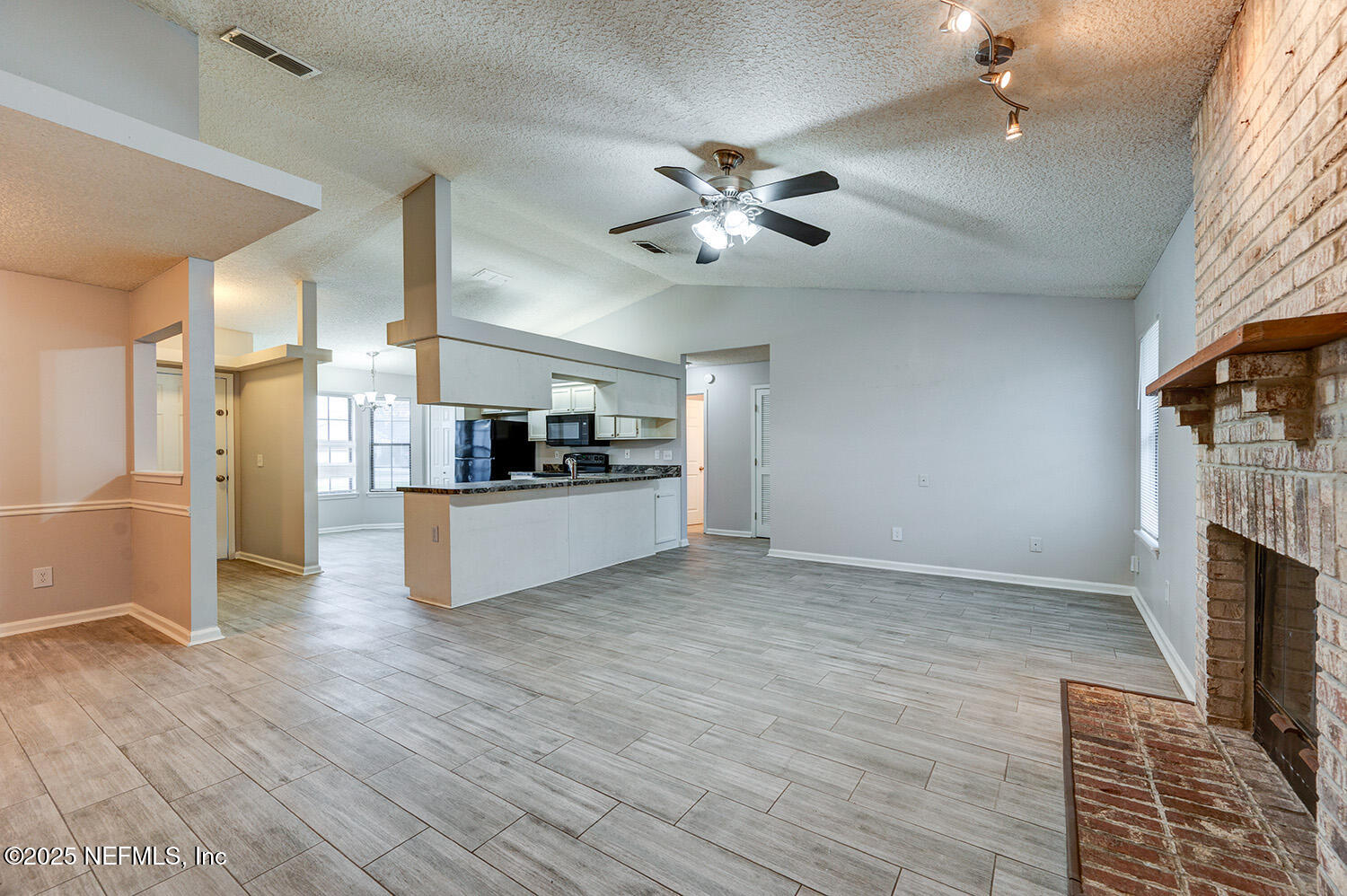 3248 Dowitcher Lane Orange Park, FL 32065 - Photo 5 of 23 a view of a kitchen with a sink and a kitchen counter top space