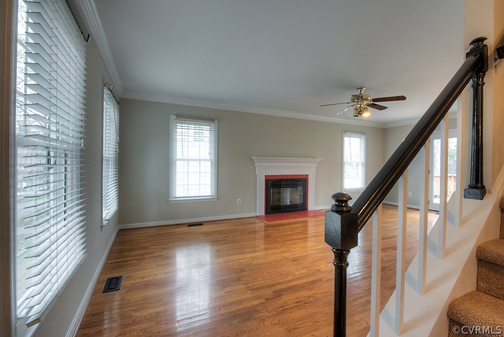 13910 Sandy Oak Road Chester, VA 23831 - Photo 7 of 32 a view of entryway and hall with wooden floor