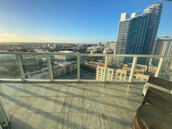a view of a balcony with lake view