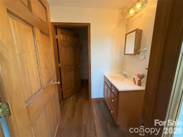 a bathroom with a shower and a toilet