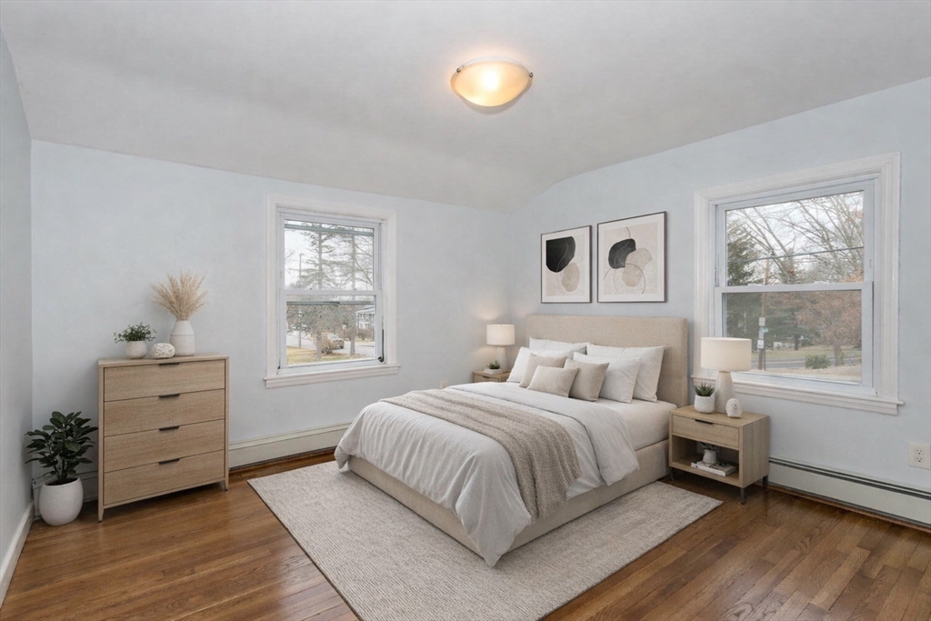 300 Chapman Street Canton, MA 02021 - Photo 11 of 16 a bedroom with a bed and window