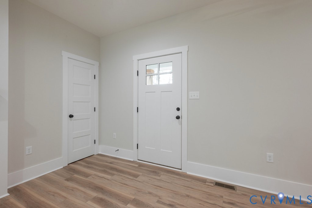 1 Tabscott Road Kents Store, VA 23084 - Photo 8 of 42 Entryway featuring a Craftsman-style door with cle