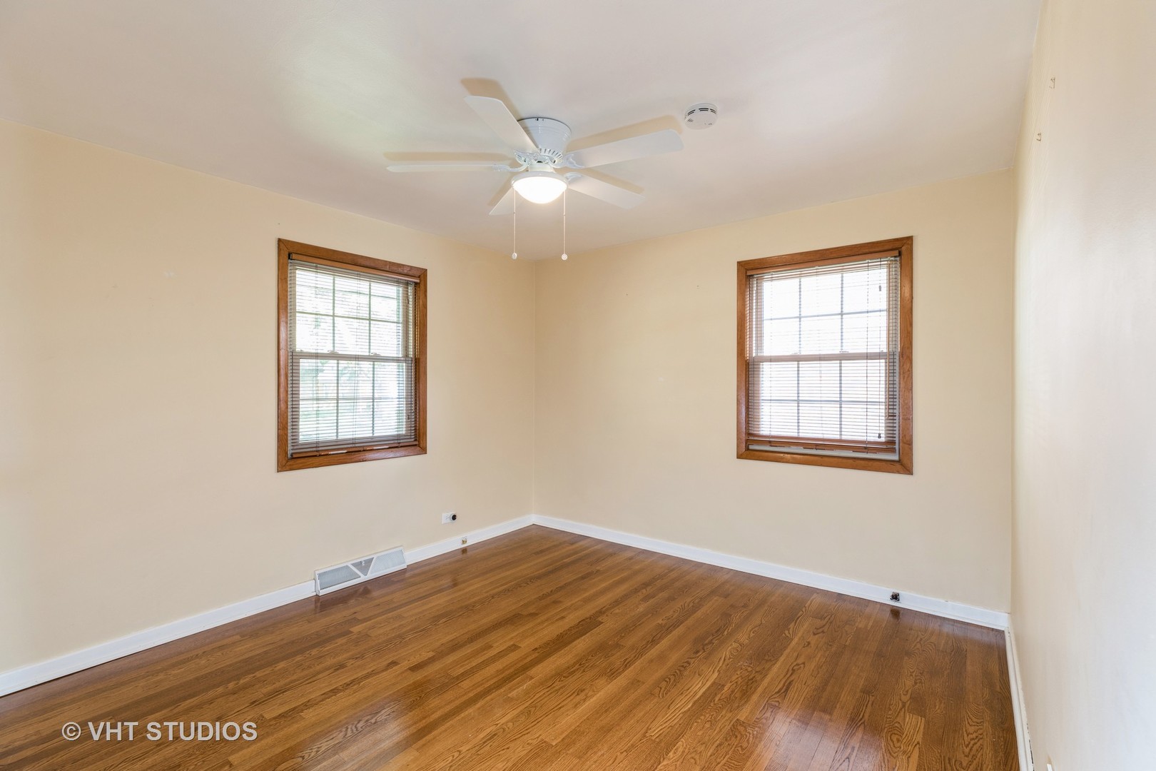 18633 Golfview Avenue Homewood, IL 60430 - Photo 13 of 18 wooden floor in an empty room with a window