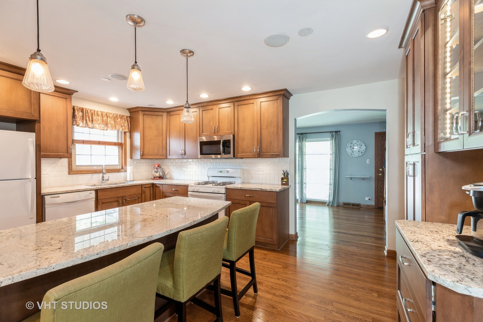 18633 Golfview Avenue Homewood, IL 60430 - Photo 3 of 18 a large kitchen with granite countertop lots of counter space and window
