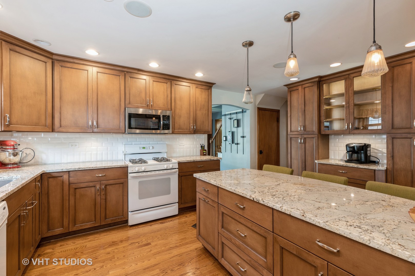 18633 Golfview Avenue Homewood, IL 60430 - Photo 4 of 18 a kitchen with stainless steel appliances granite countertop a sink a stove and a refrigerator