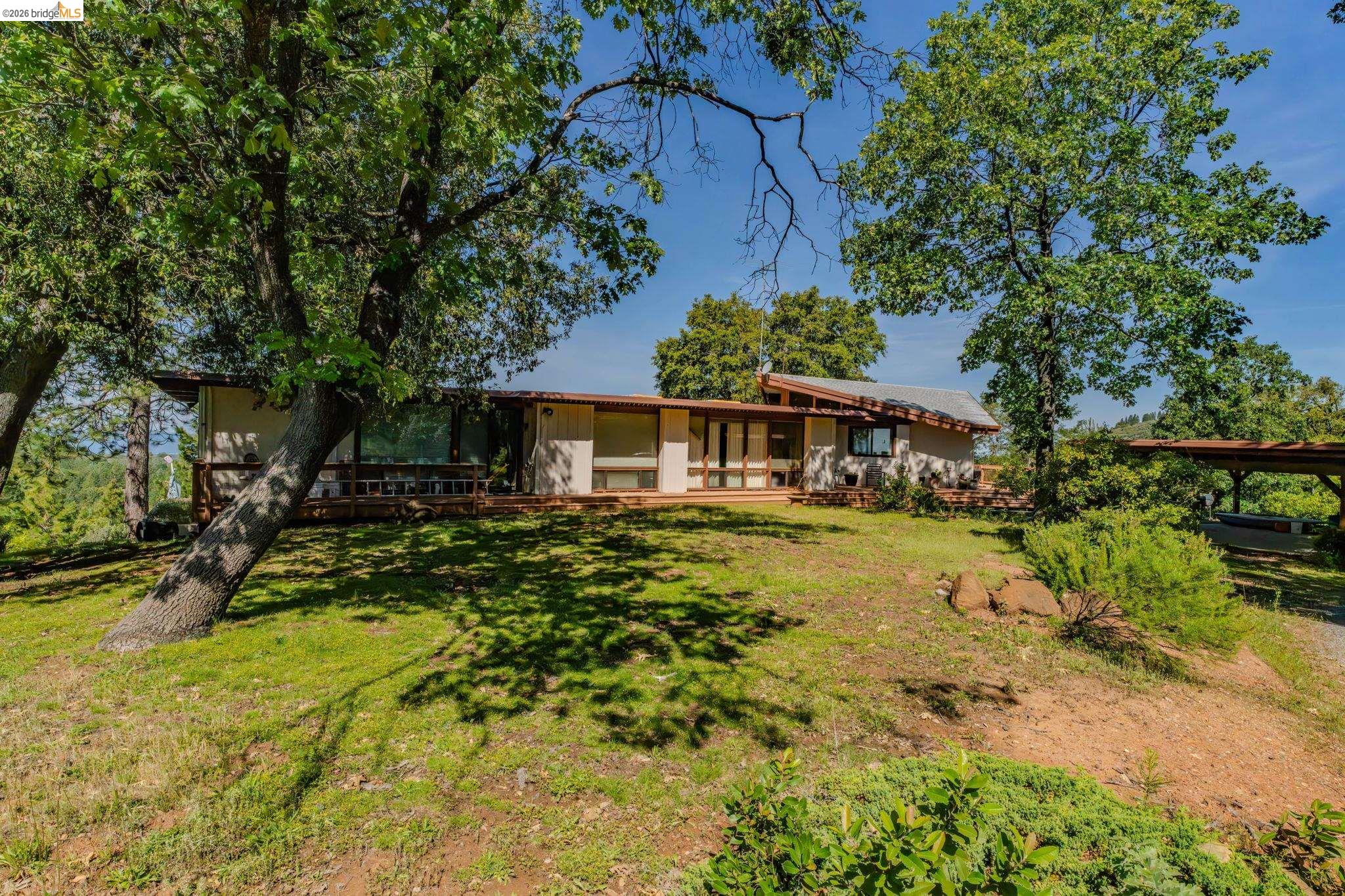 6161 Fullen Road Murphys, CA 95247 - Photo 50 of 53 a front view of a house with a yard