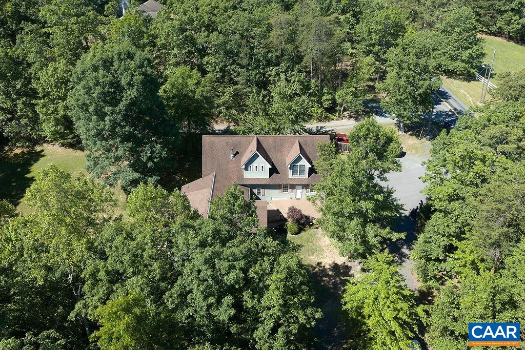 2851 Martin Kings Road Scottsville, VA 24590 - Photo 67 of 67 an aerial view of a house with a yard and lake view