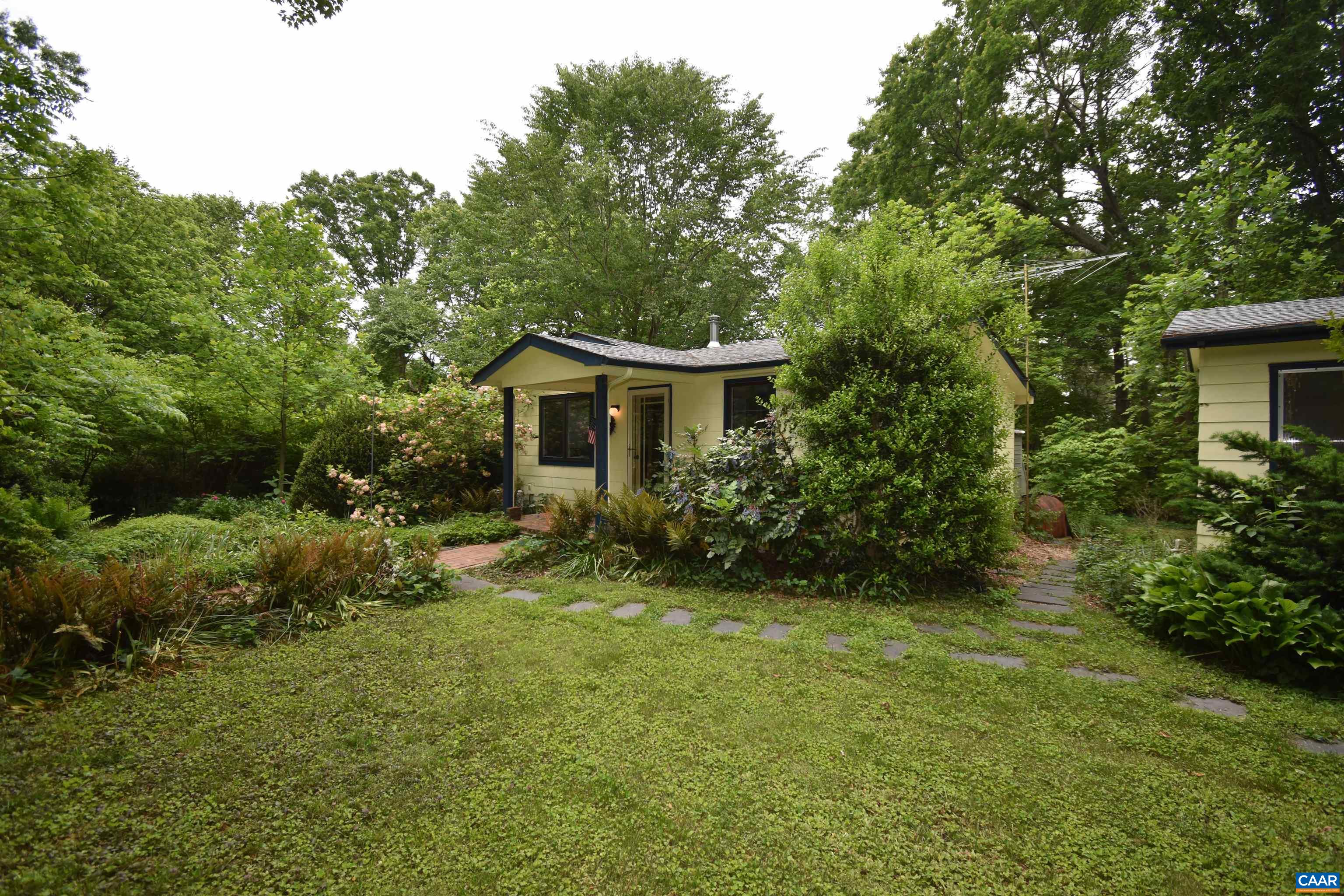 7032 Celt Road Stanardsville, VA 22973 - Photo 5 of 50 a view of a house with a yard and plants