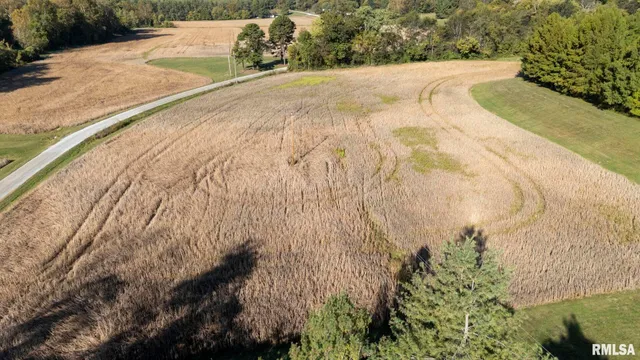 a view of a golf course with a house