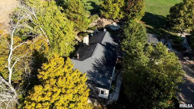 a living room with furniture fireplace and flat screen tv