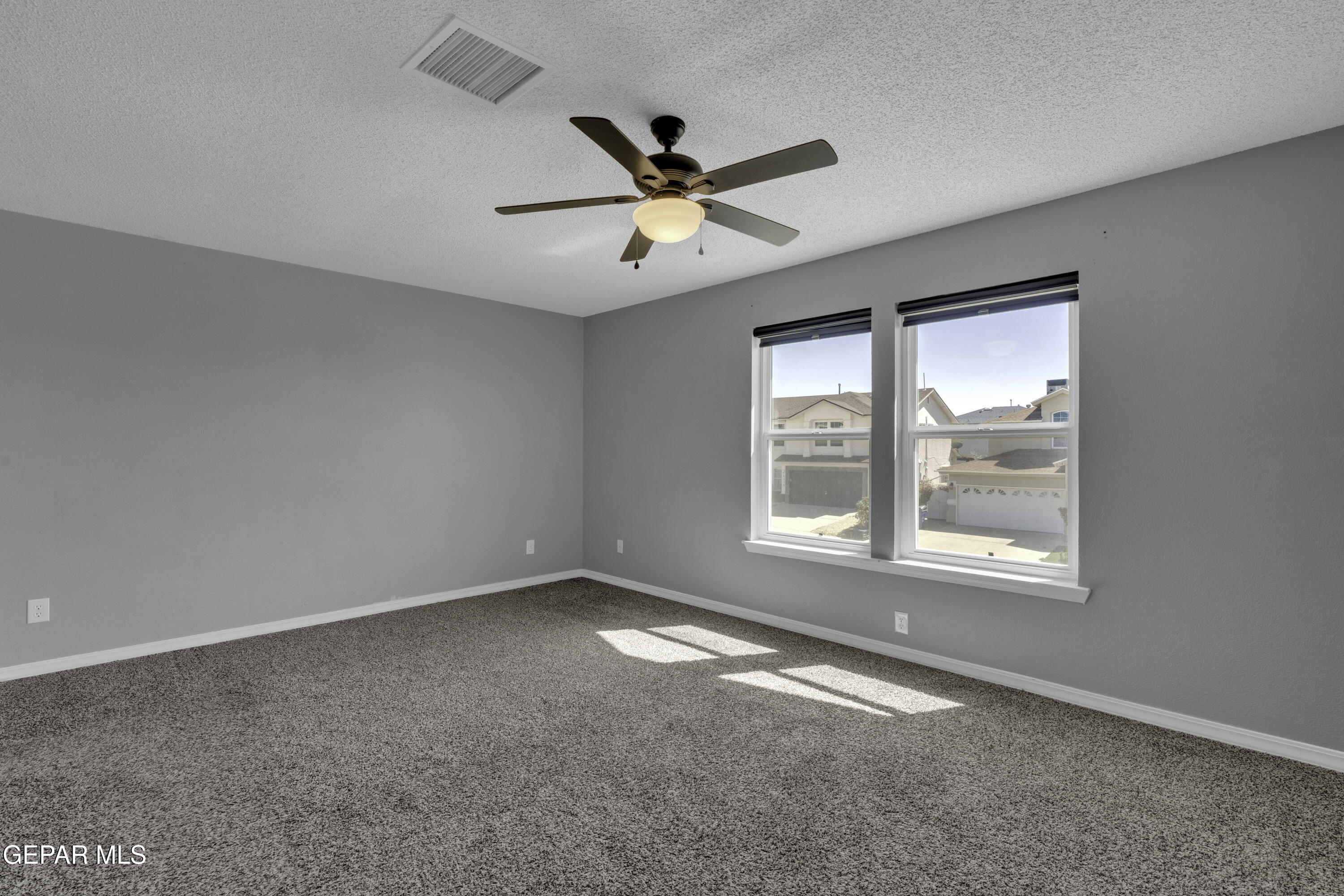 6341 Cougar Ridge Lane El Paso, TX 79912 - Photo 43 of 71 a view of an empty room with a window
