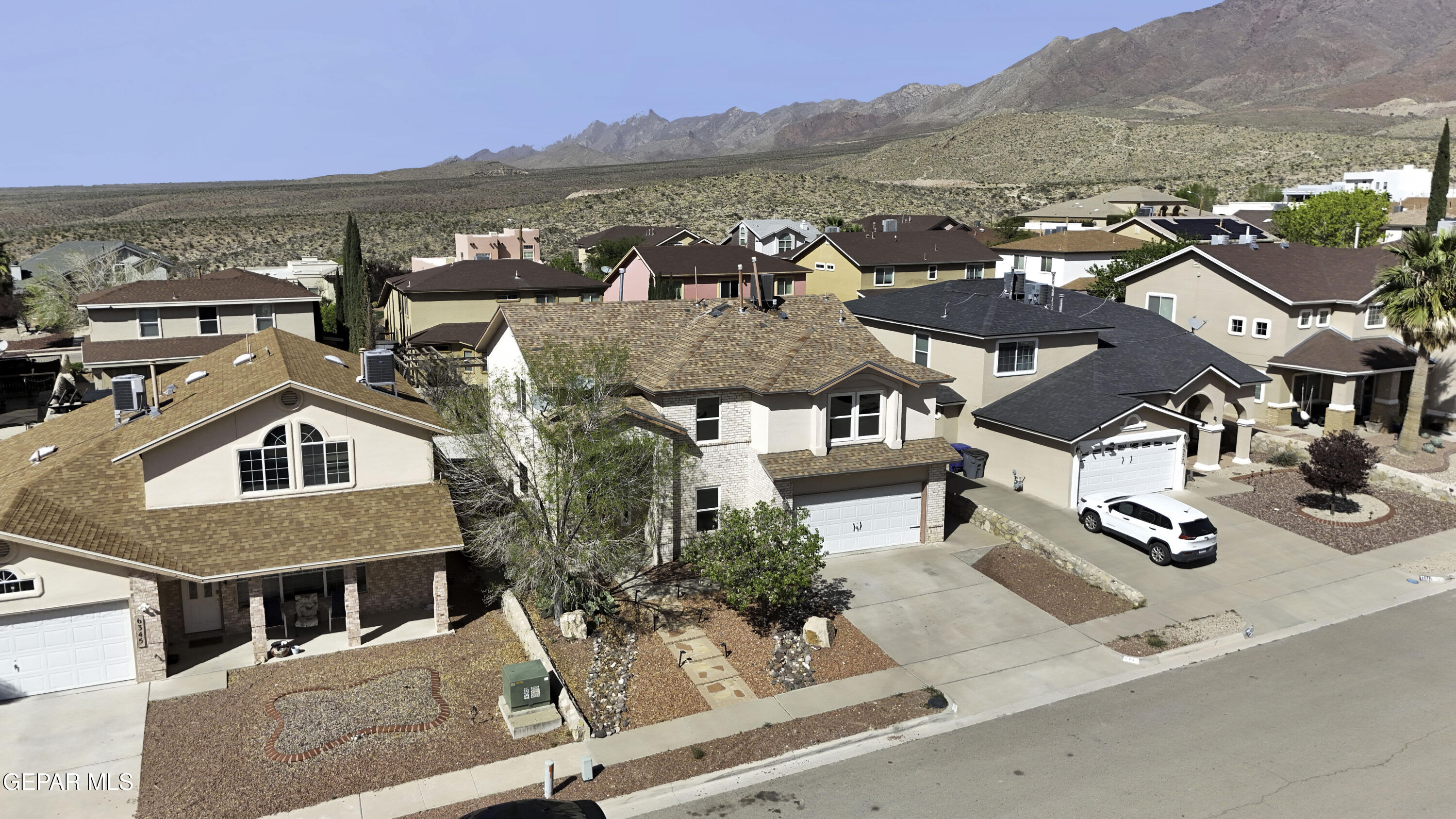 6341 Cougar Ridge Lane El Paso, TX 79912 - Photo 63 of 71 an aerial view of residential houses with outdoor space