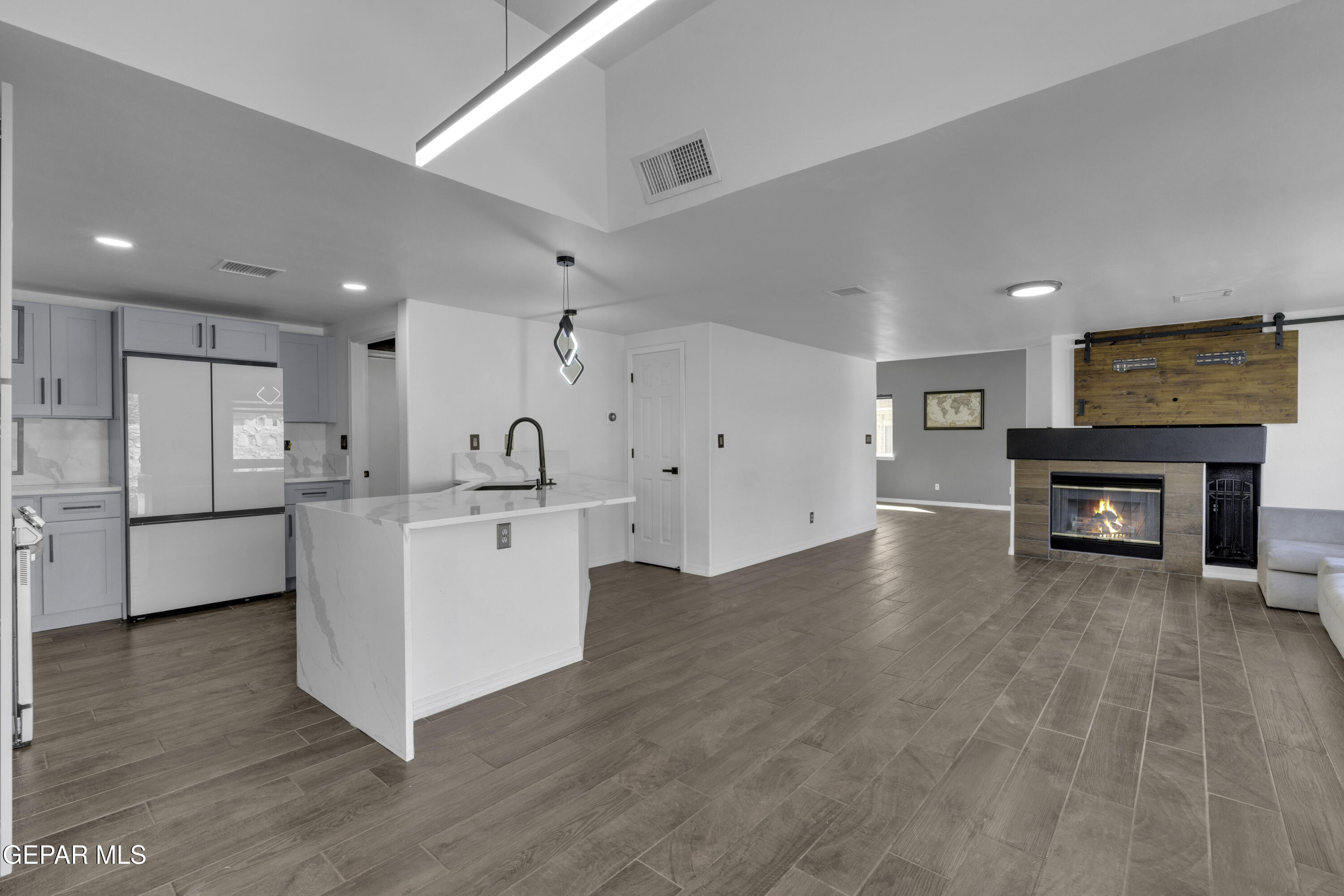 6341 Cougar Ridge Lane El Paso, TX 79912 - Photo 10 of 71 a view of kitchen with furniture and wooden floor