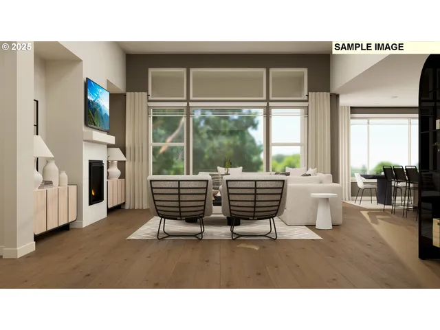 a room with a bed and large windows