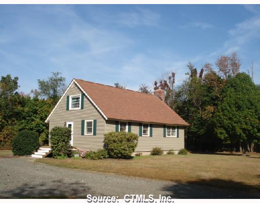 Exterior Front. great home in Oxford on a level 1.50 acre lot
