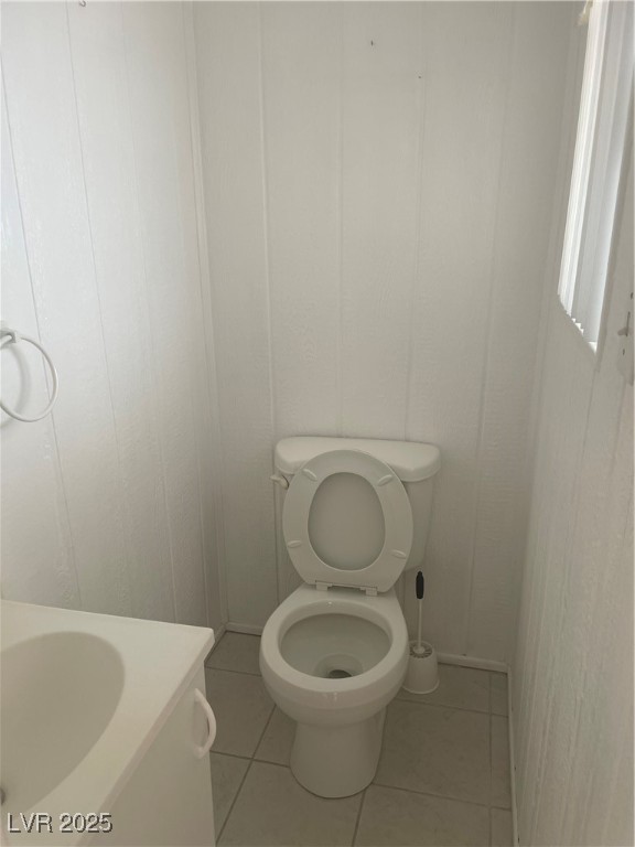 4641 Royal Ridge Boulevard Las Vegas, NV 89103 - Photo 29 of 38 Bathroom featuring tile patterned flooring and vanity