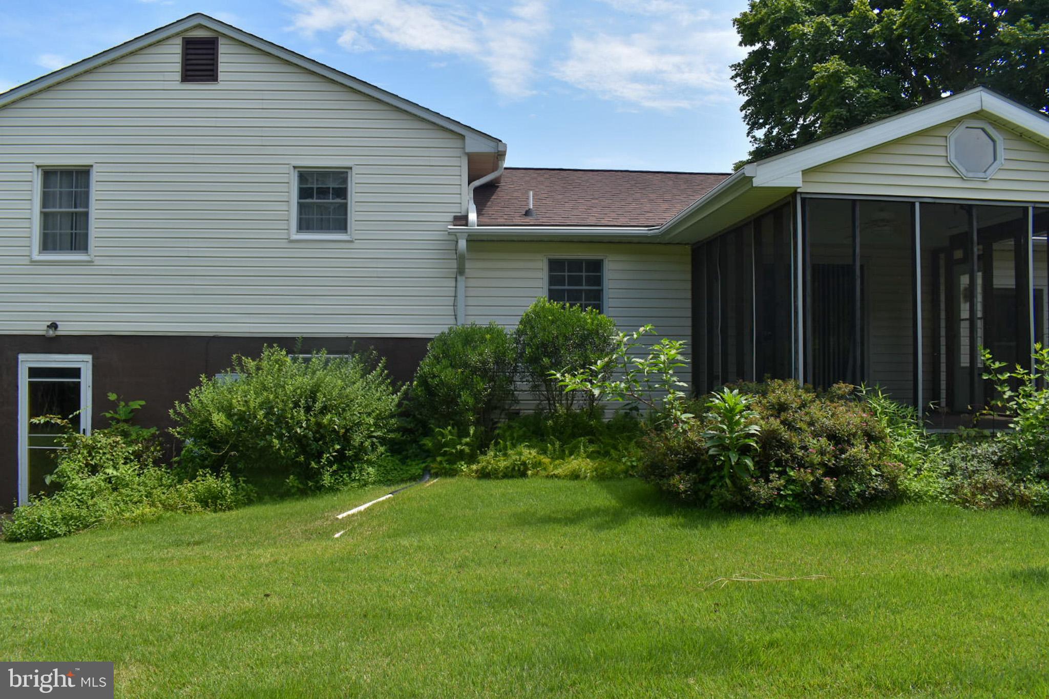 15650 Gibson Mill Road Culpeper, VA 22701 - Photo 24 of 28 Charming home with lush greenery backdrop.