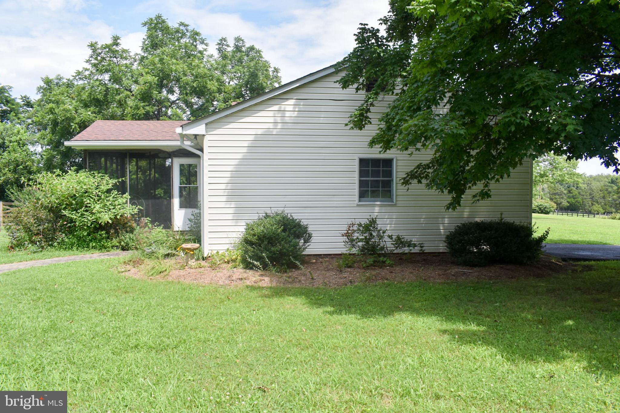 15650 Gibson Mill Road Culpeper, VA 22701 - Photo 27 of 28 Charming home nestled in lush greenery.
