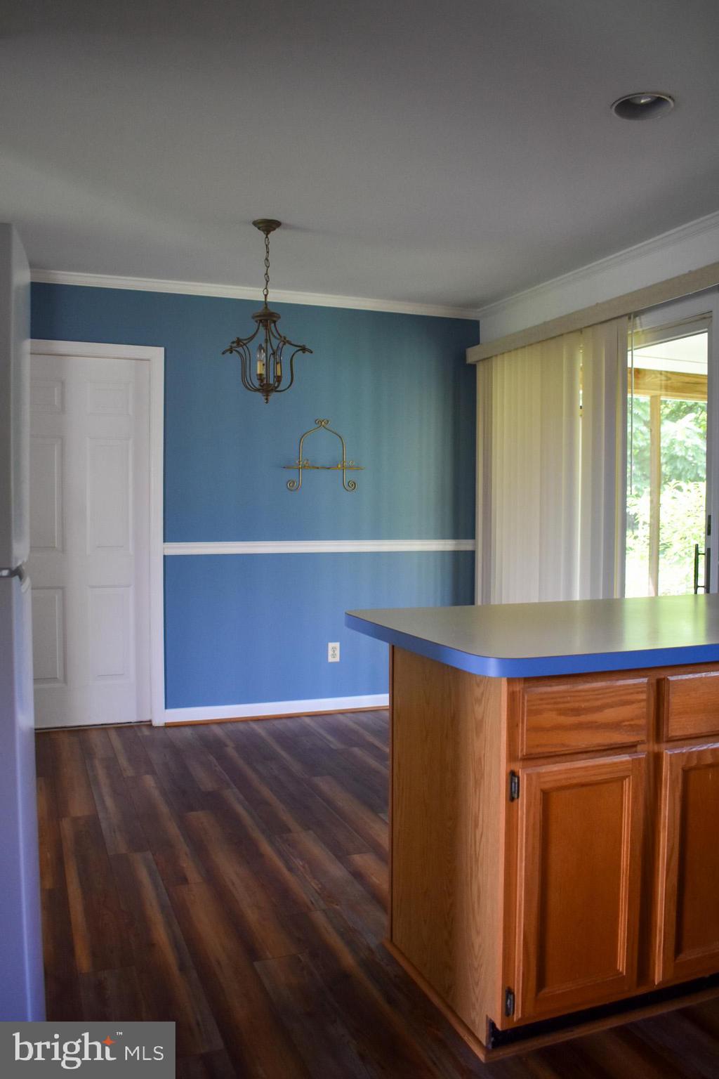 15650 Gibson Mill Road Culpeper, VA 22701 - Photo 10 of 28 Bright and airy kitchen with blue accents.