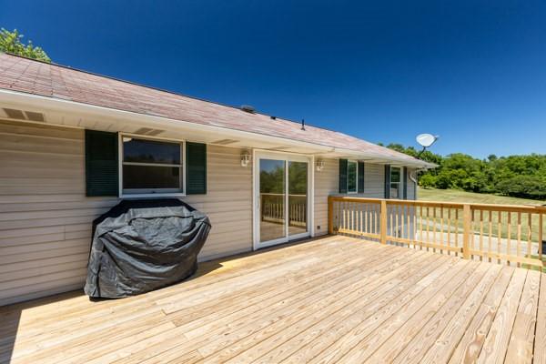 952 Achortown Road Beaver Falls, PA 15010 - Photo 16 of 43 a view of a house with a balcony and wooden floor