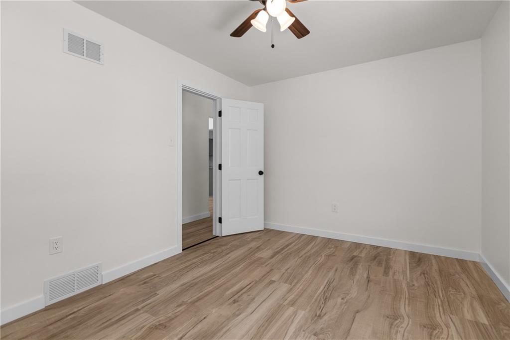 952 Achortown Road Beaver Falls, PA 15010 - Photo 17 of 43 wooden floor in an empty room