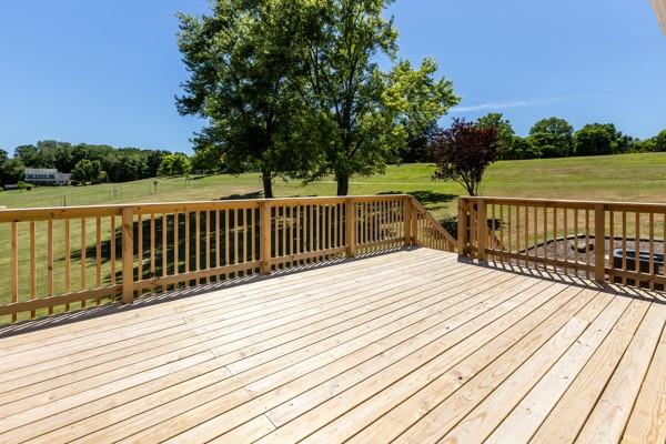 952 Achortown Road Beaver Falls, PA 15010 - Photo 28 of 43 a balcony with wooden floor and lake view
