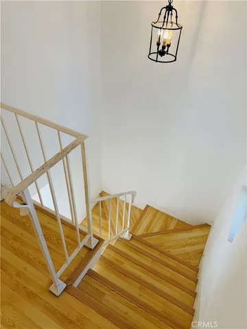 a view of an empty room with stairs