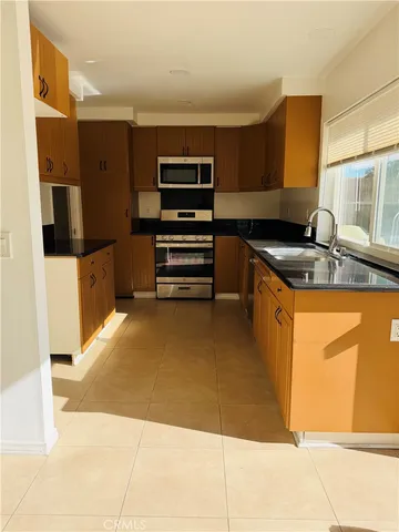 a view of an empty room with stairs