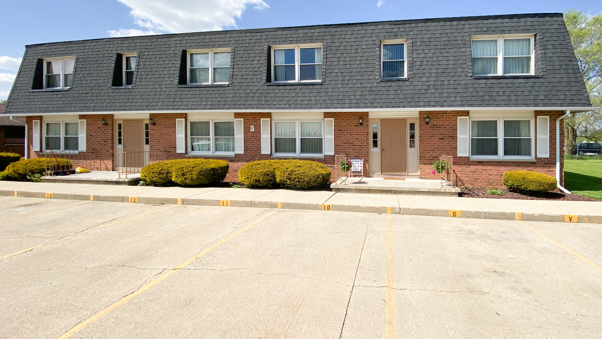 2 Michael Street, Unit 1 Streator, IL 61364 - Photo 8 of 8 a front view of a building with cars parked