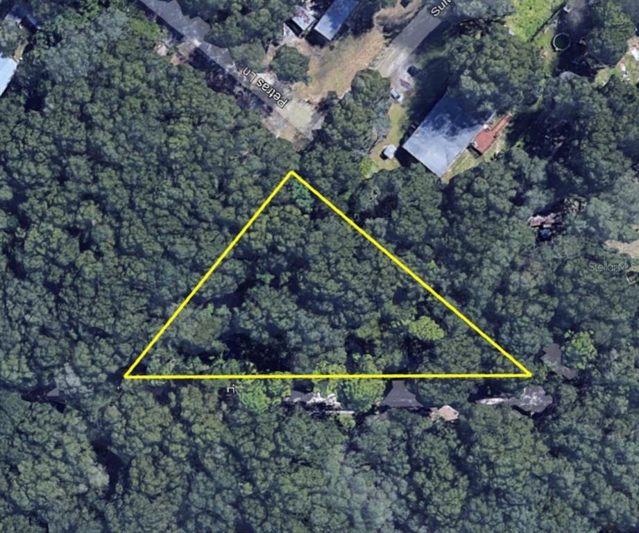 Tbd Sultana Lane Spring Hill, FL 34610 - Photo 3 of 8 a aerial view of a house