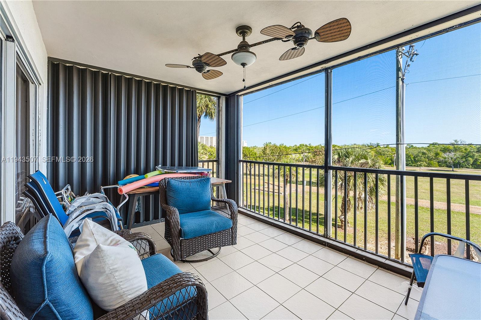 275 Palm Avenue, Unit B207 Jupiter, FL 33477 - Photo 20 of 29 a living room with furniture