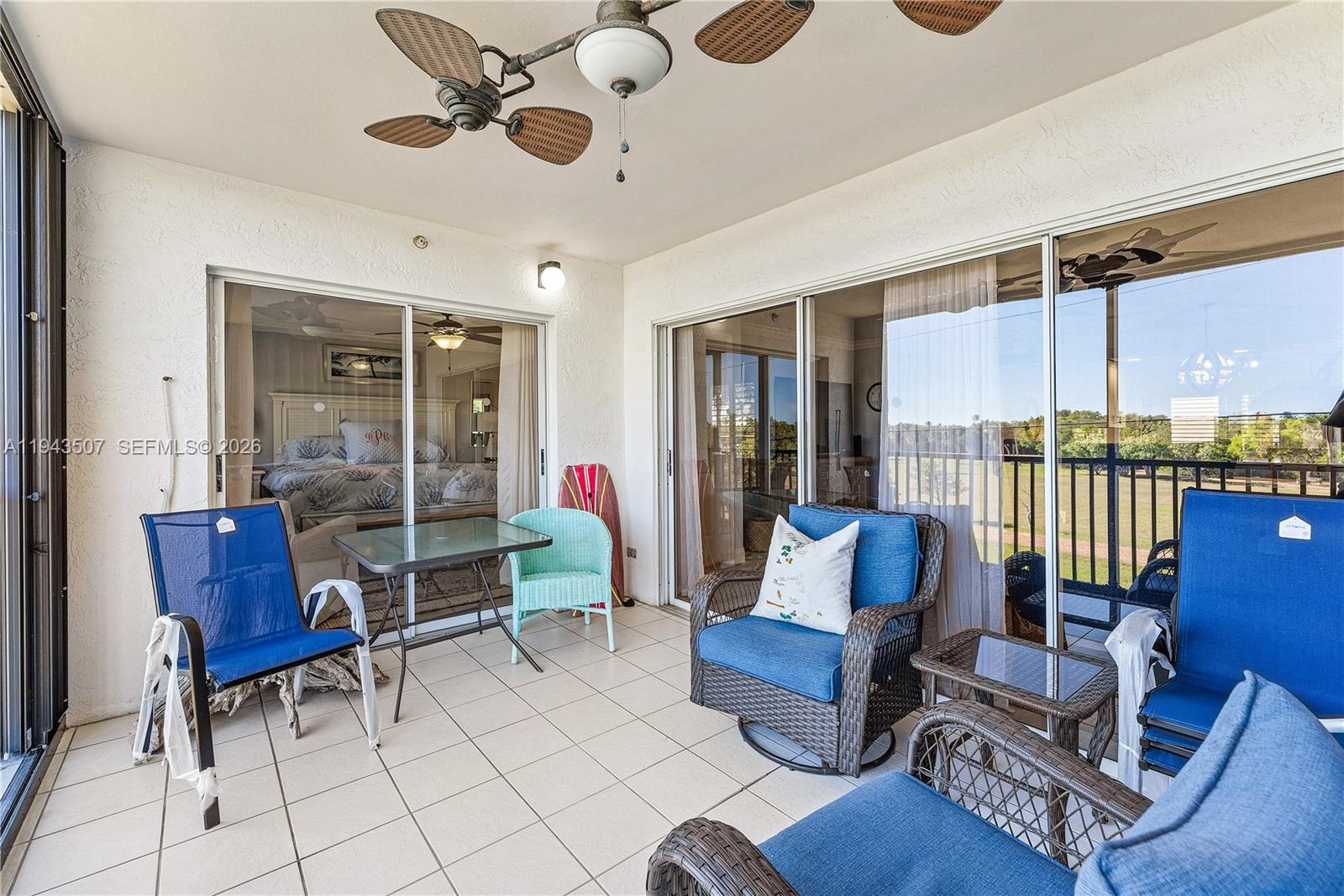 275 Palm Avenue, Unit B207 Jupiter, FL 33477 - Photo 22 of 29 a living room with furniture