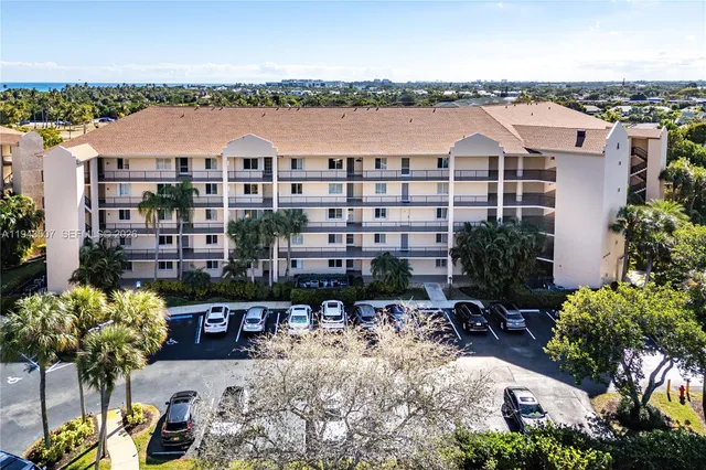 a view of a lake with building in front of it