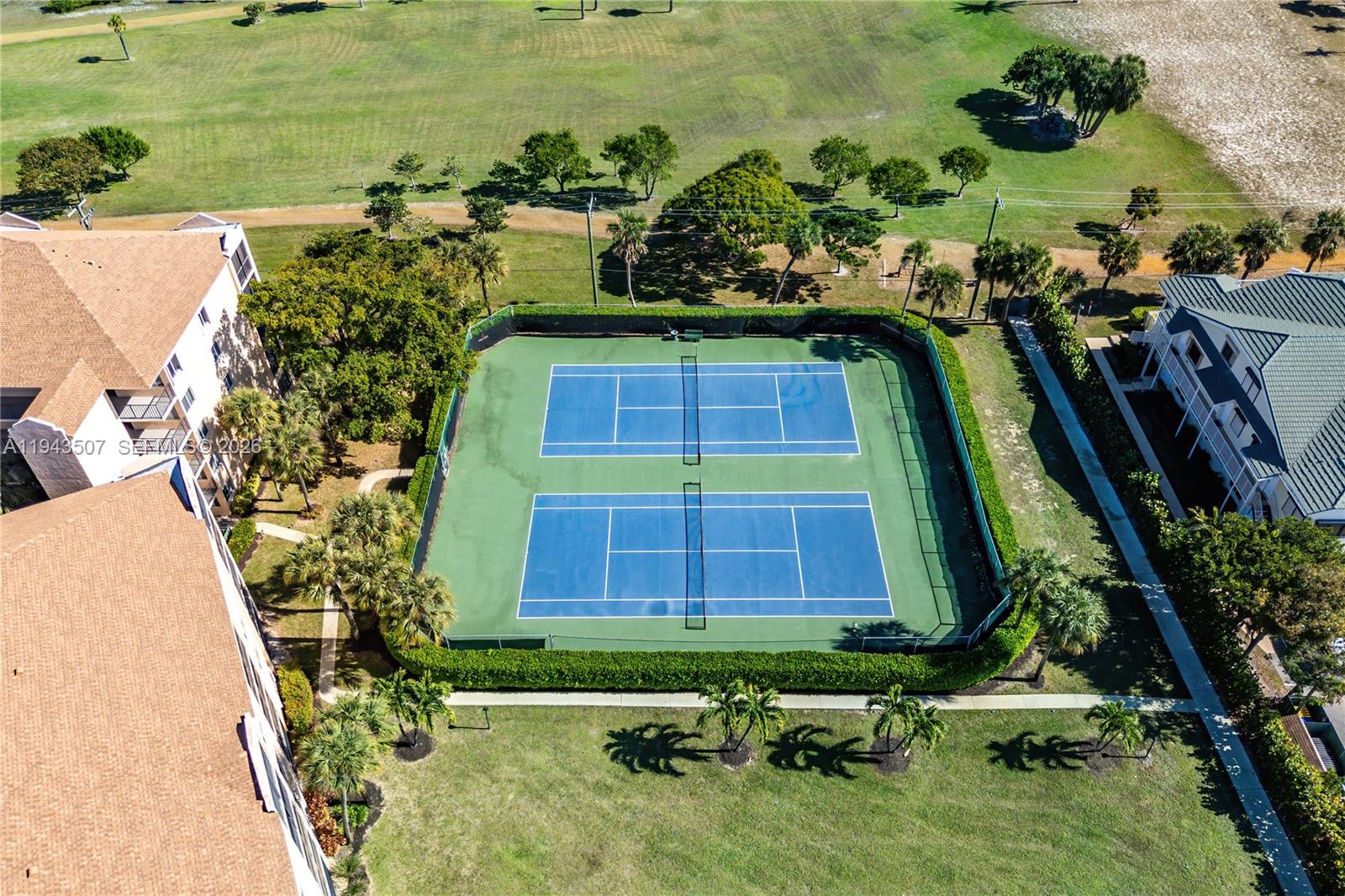 275 Palm Avenue, Unit B207 Jupiter, FL 33477 - Photo 24 of 29 an aerial view of a house with a yard and potted plants