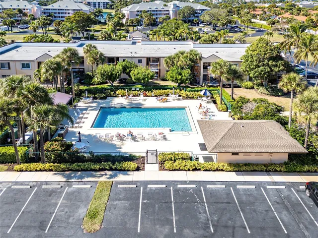 a view of a swimming pool and outdoor space