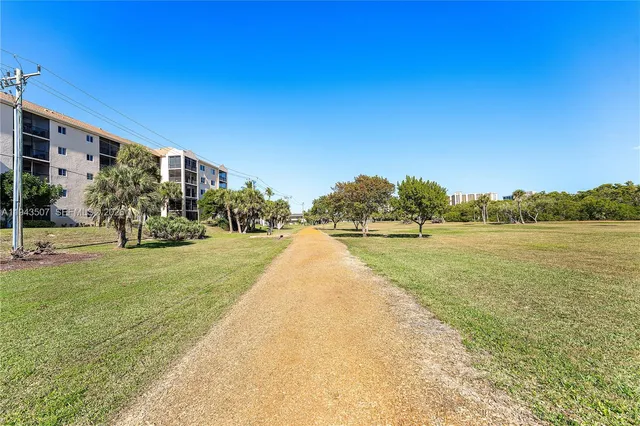 a view of lake with residential house